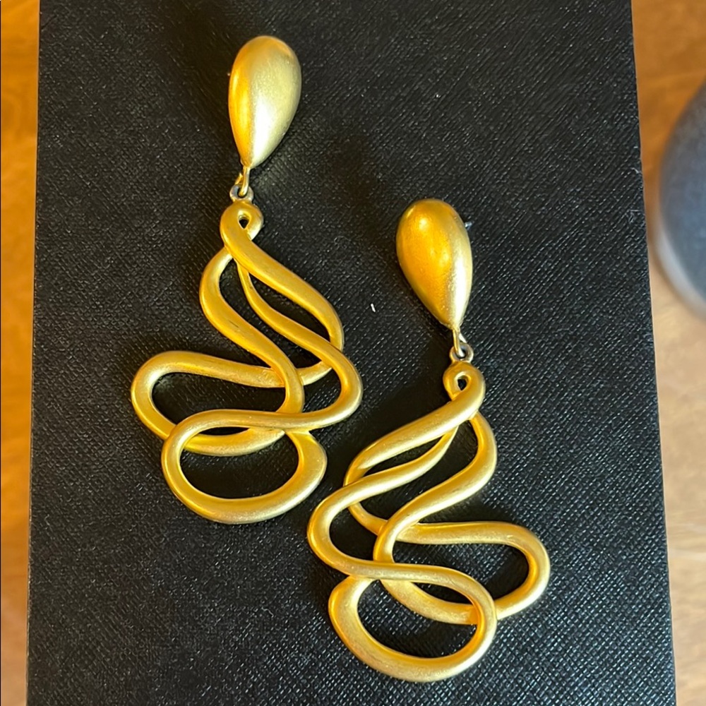 Bright gold hanging earrings about 2” long